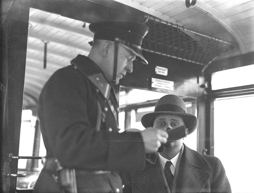 Document check in a tram Document check in a tram.