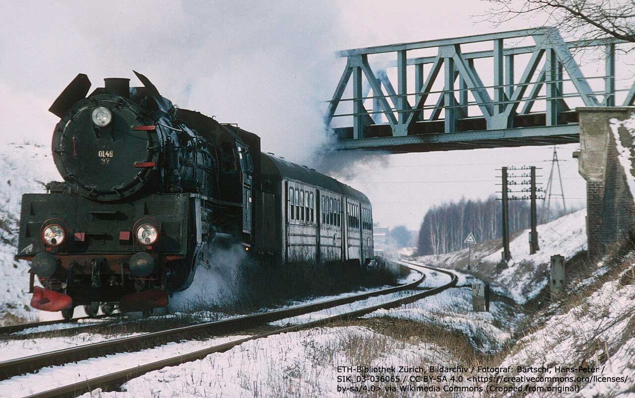 Steam hauled passenger train in Poland.